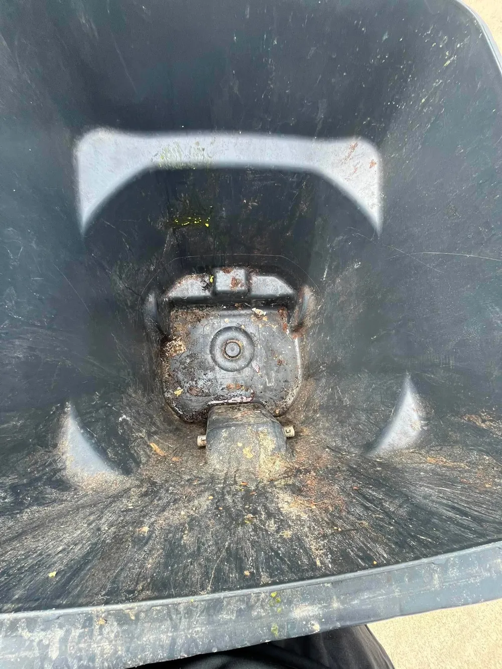 Dirty trash bin interior before Trash Splash cleaning
